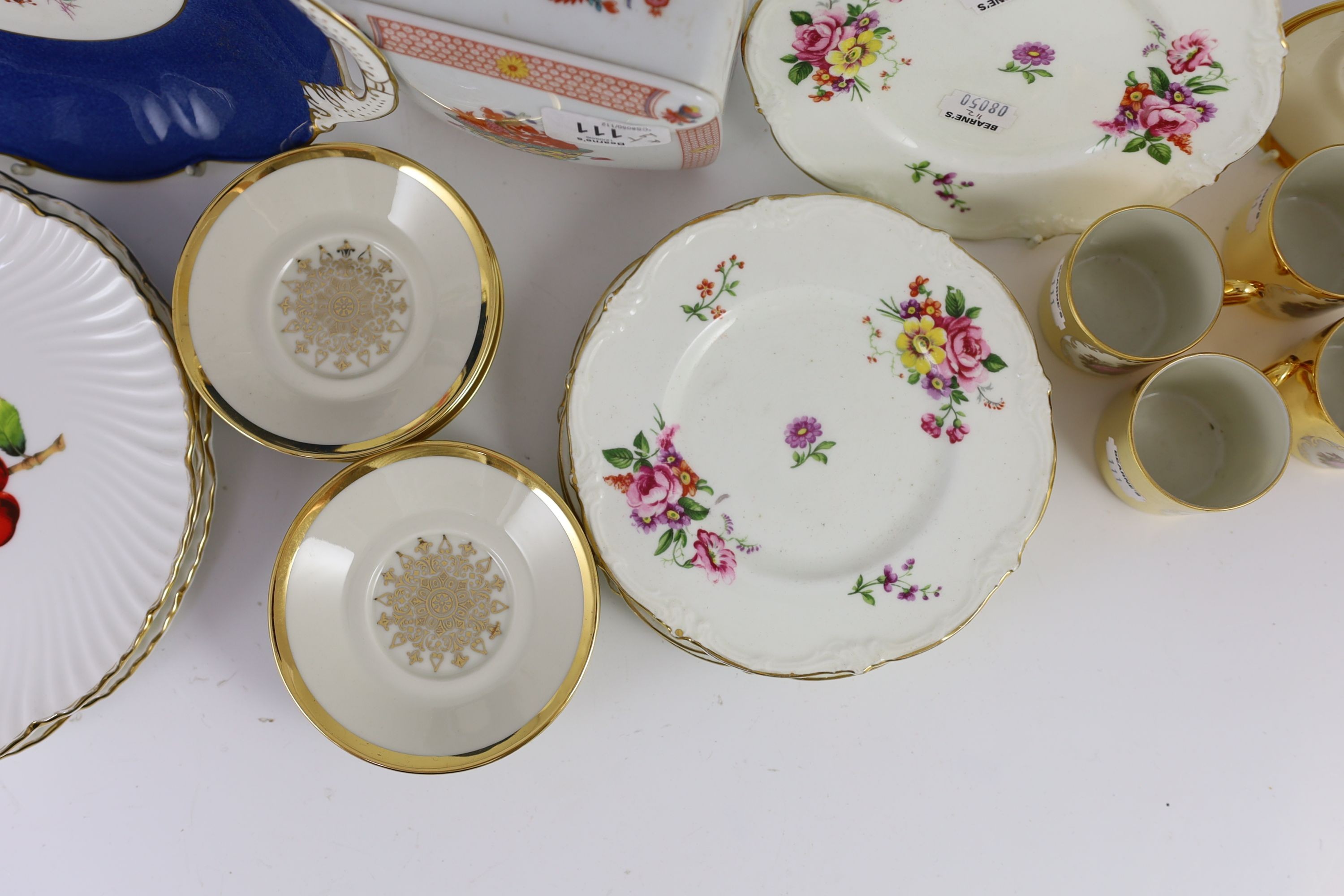 A set of eight German gold ground coffee cans and saucers